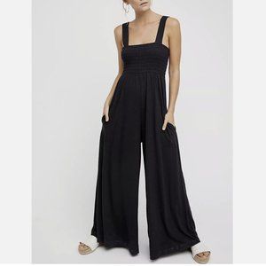 FREE PEOPLE BLACK SLEEVELESS SMOCKED WIDE LEG HOMECOMING JUMPSUIT